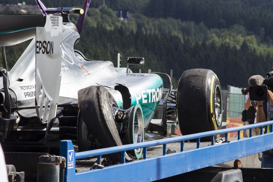 Nico Rosberg's Mercedes returns to the pits