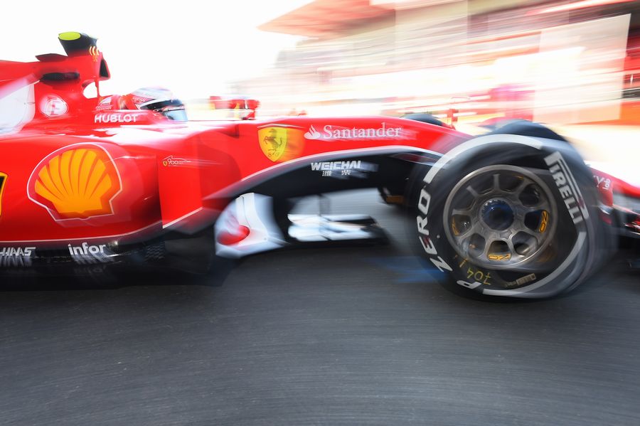 Kimi Raikkonen pulls out of the Ferrari garage