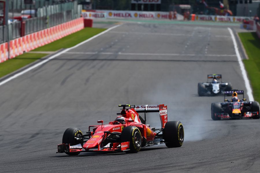 Kimi Raikkonen locks up in the Ferrari