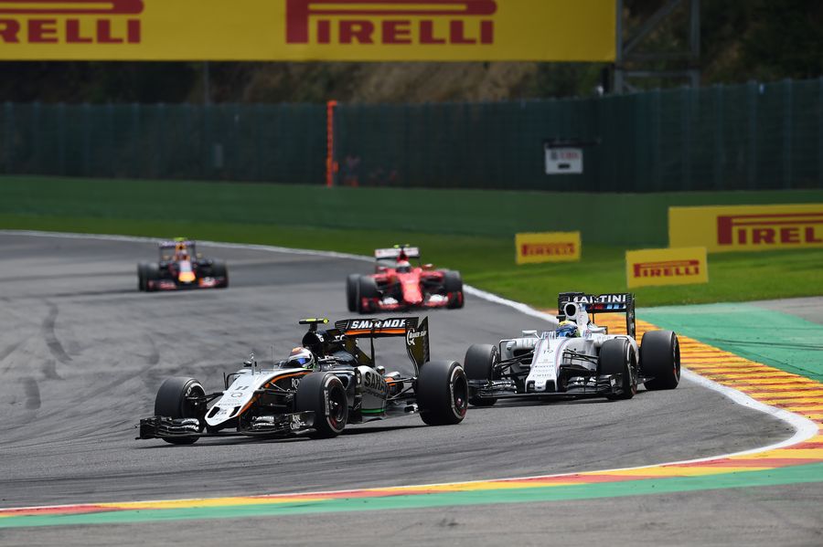 Sergio Perez battles a position with Felipe Massa