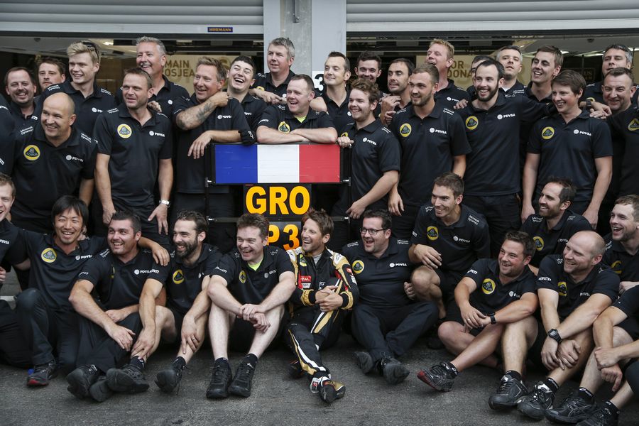 Romain Grosjean celebrates his third finish with Lotus