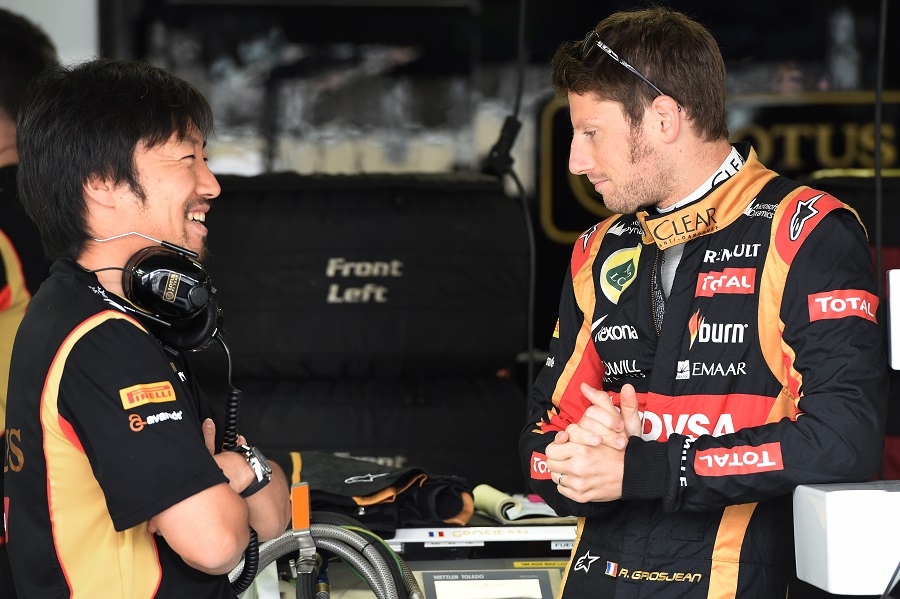 Romain Grosjean chats with Ayao Komatsu