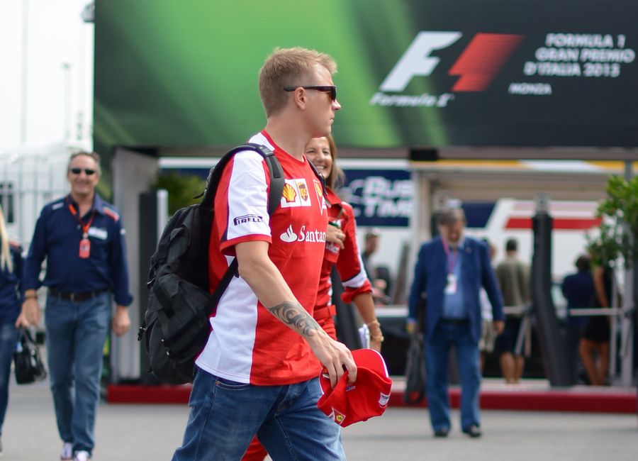 Kimi Raikkonen arrives the paddock