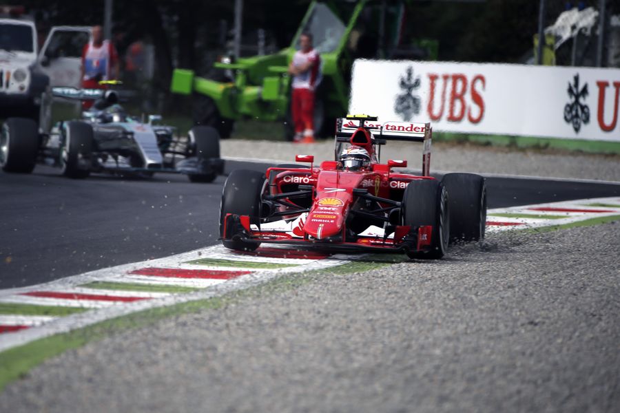 Kimi Raikkonen runs wide in the Ferrari