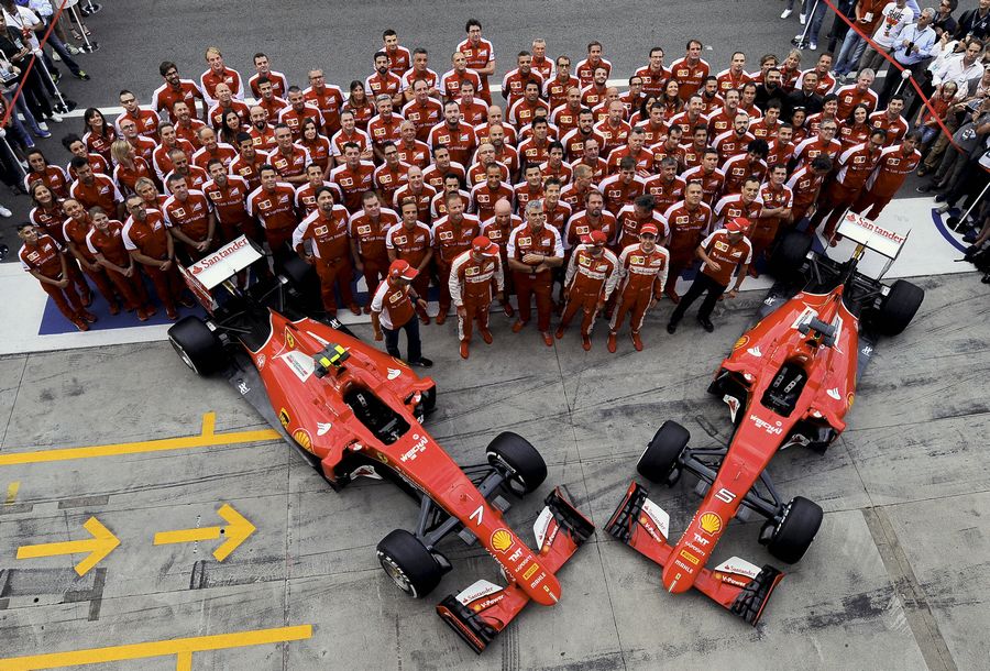 Ferrari members pose for team photo