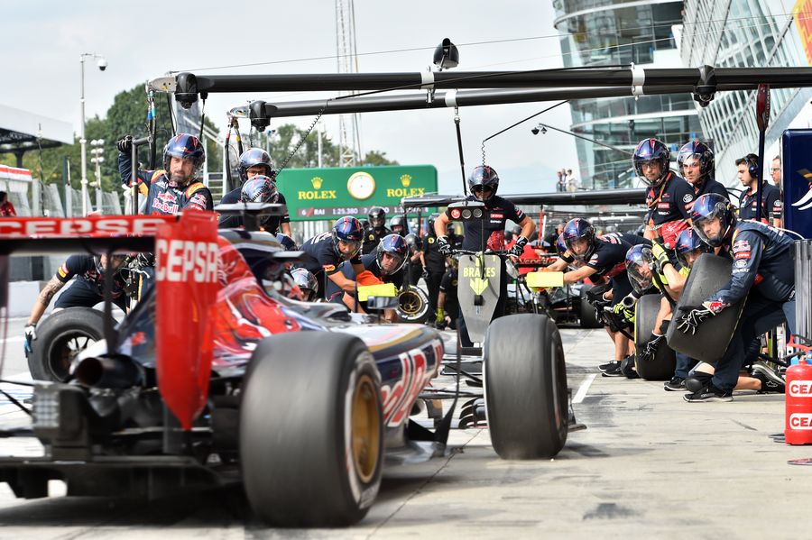 Max Verstappen makes a pit stop during FP2