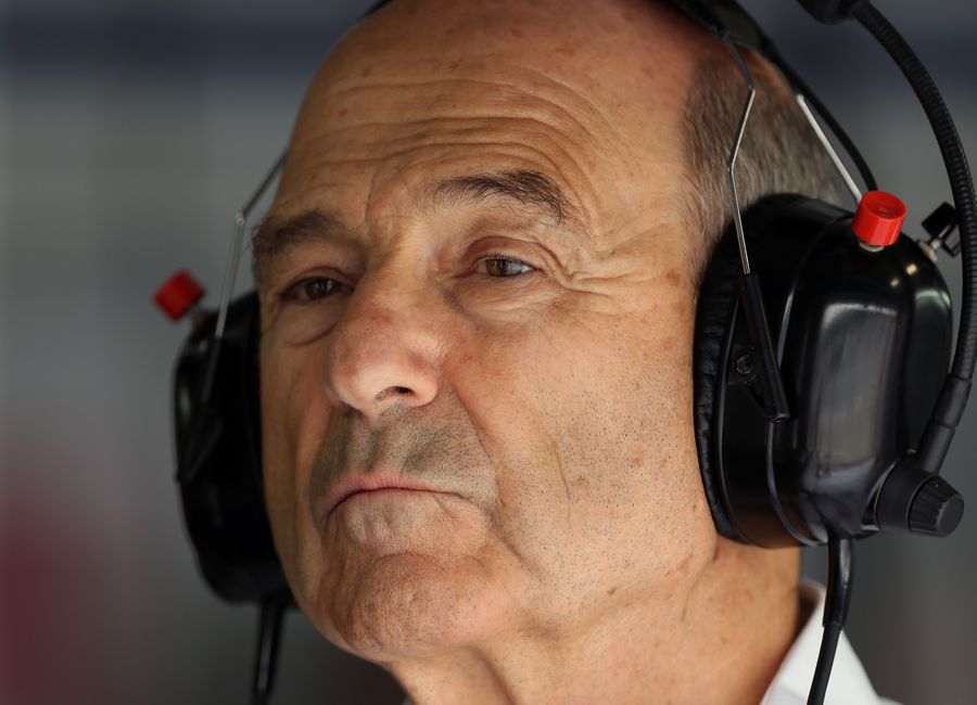Peter Sauber watches on from garage