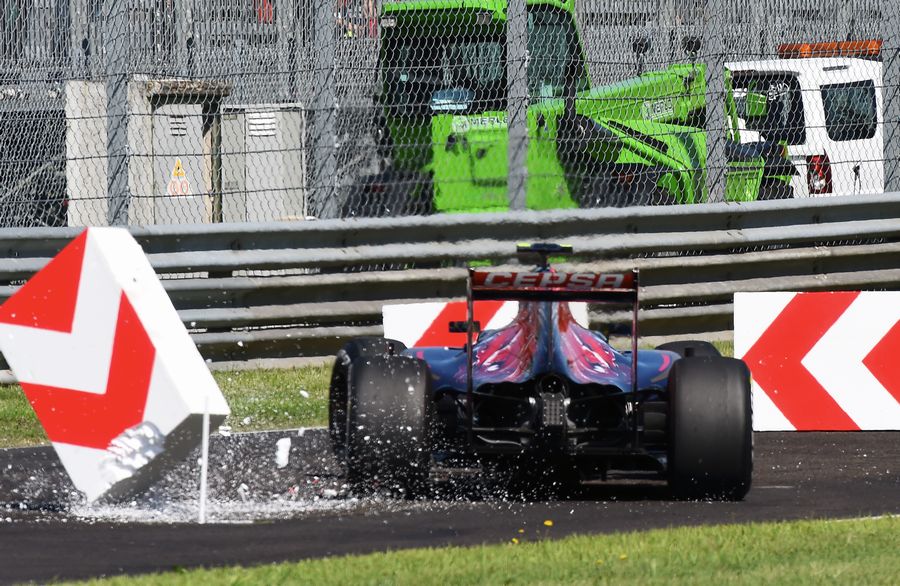 Carlos Sainz crashes into marker board