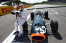 Jackie Stewart poses with BRM P261