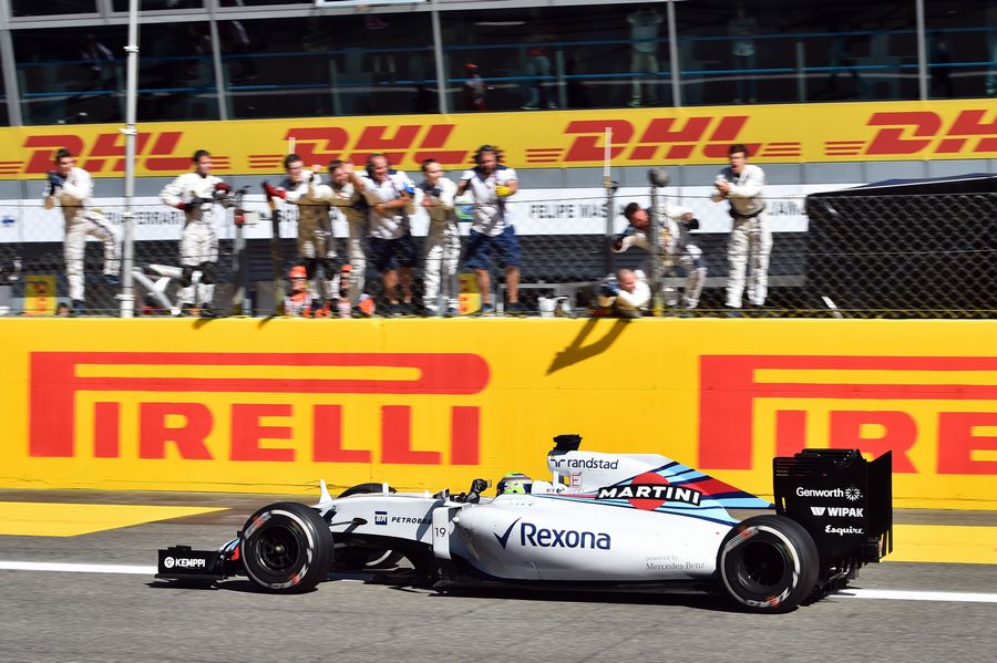 Felipe Massa and Williams celebrate as he takes the chequered flag