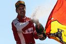 Sebastian Vettel celebrates on the podium