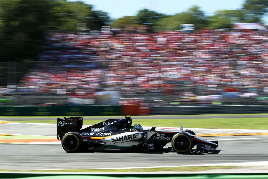 Sergio Perez works hard to keep pace