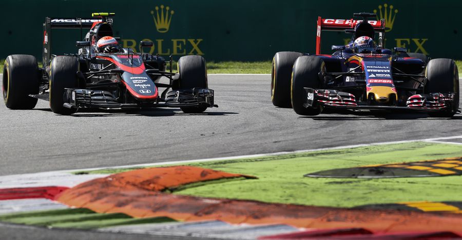Jenson Button defends from Max Verstappen