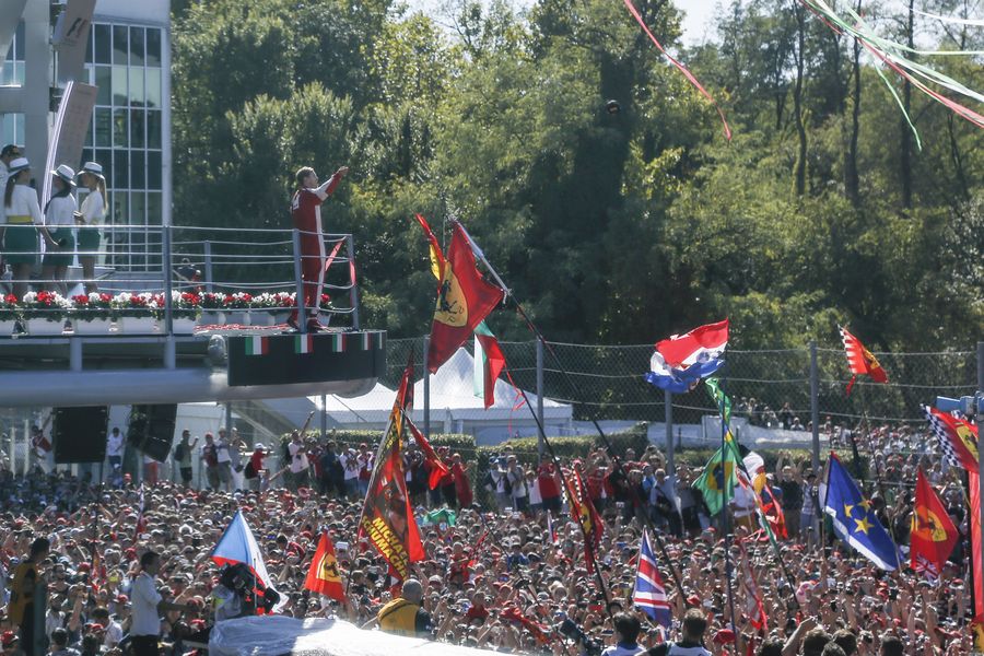 Sebastian Vettel throw his hat into crowd