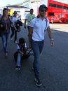 Felipe Massa arrives the paddock with his son Felipinho