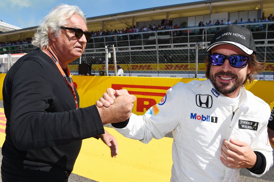 Fernando Alonso with Flavio Briatore on the grid