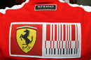 The back of a Ferrari mechanic