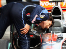 Mark Webber checks out McLaren's F-duct