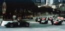 Jo Bonnier takes the lead at the start from Tony Brooks, Jack Brabham, and eventual winner Stirling Moss