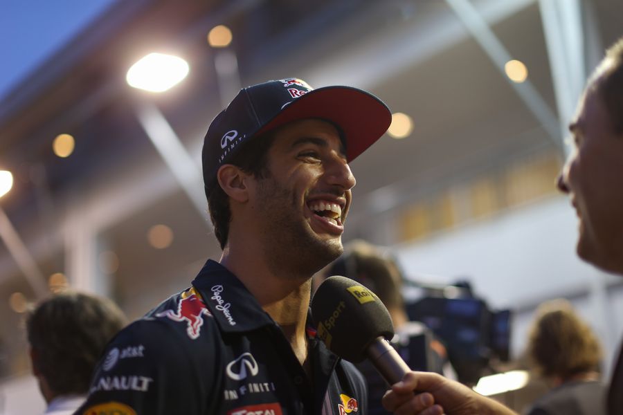 Daniel Ricciardo talks with media