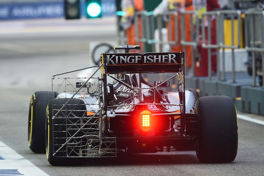 Sergio Perez makes his way down the pit lane with aero sensor