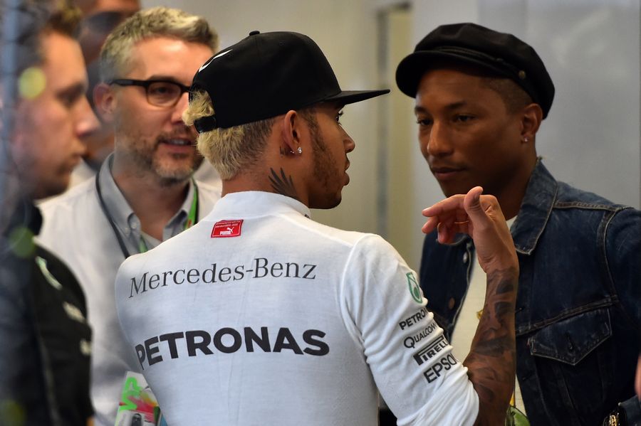 Lewis Hamilton and Pharrell Williams in the Mercedes garage