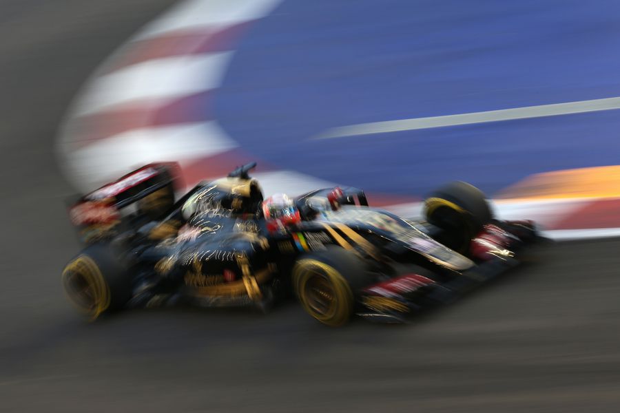 Romain Grosjean guides his Lotus around the track