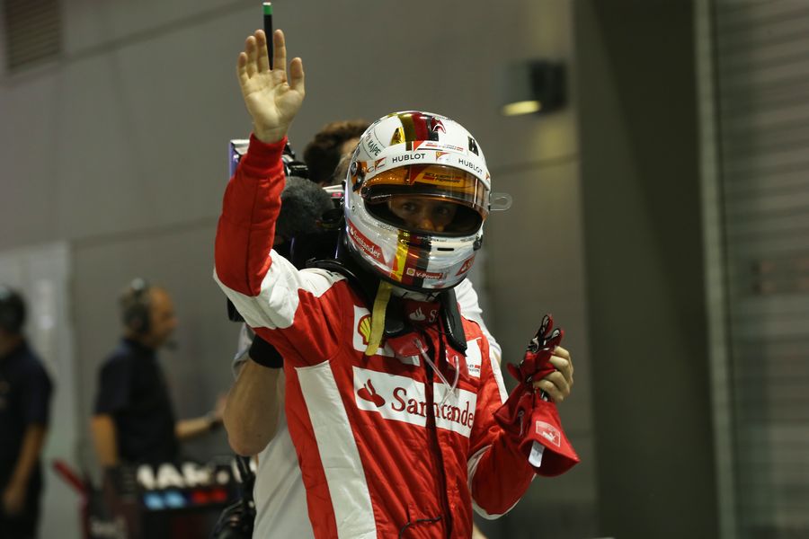 Sebastian Vettel celebrates taking pole position