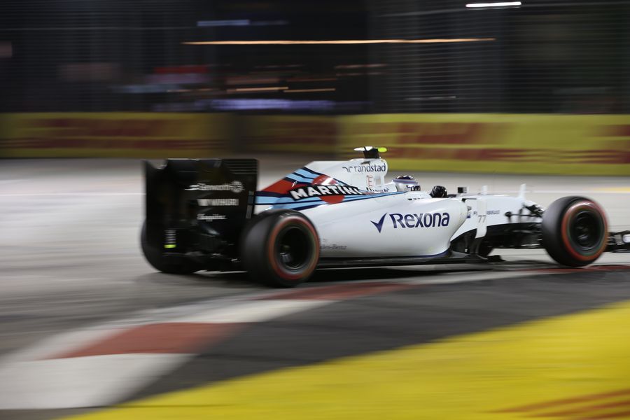Valtteri Bottas rides the kerb in his Williams