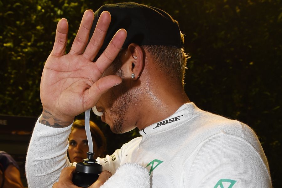 Lewis Hamilton is unwilling to have a photo taken after qualifying