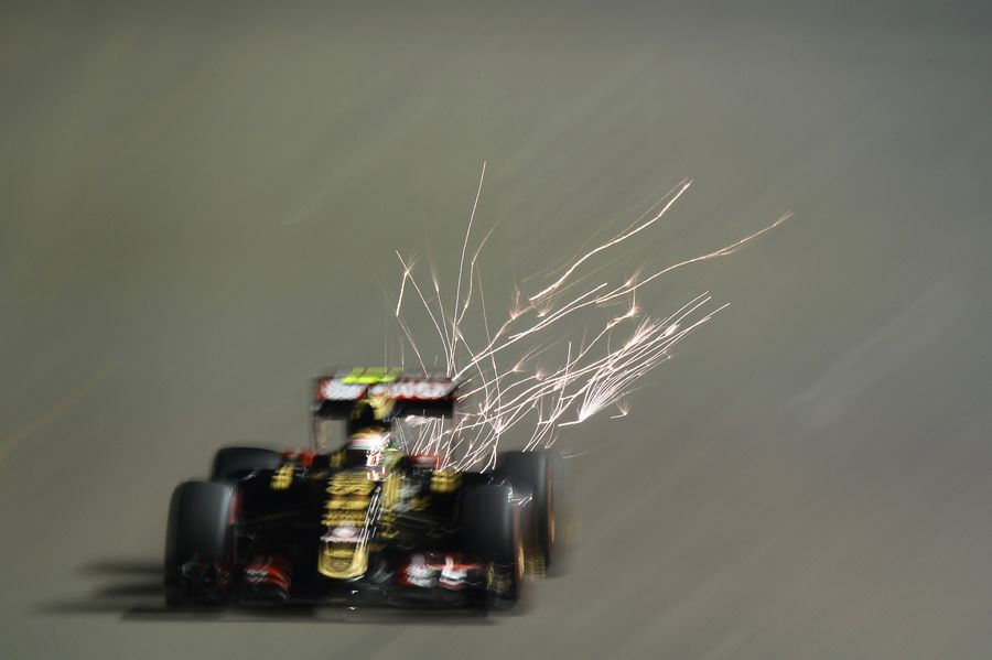Sparks fly from Pastor Maldonado's Lotus