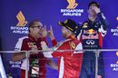 Sebastian Vettel celebrates on the podium with Modesta Menabue, Ferrari Engine Specialist