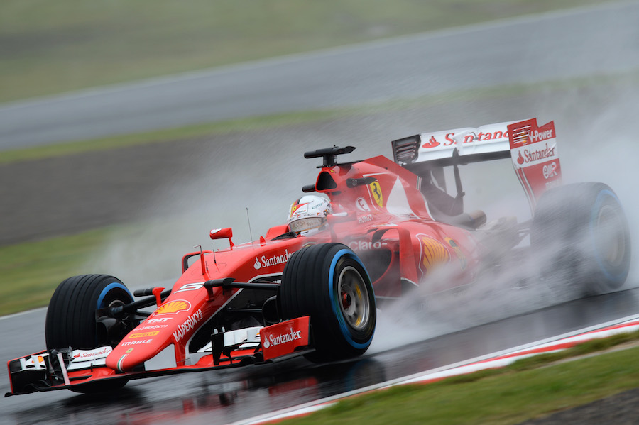 Sebastian Vettel on track with wet tyres