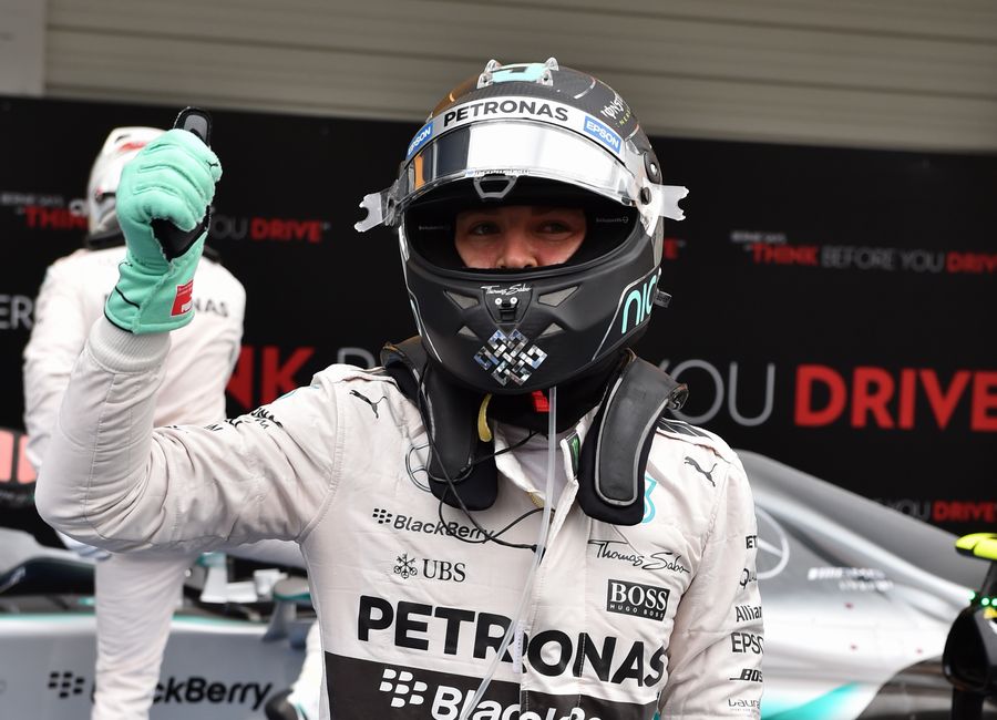 Nico Rosberg celebrates taking the pole position