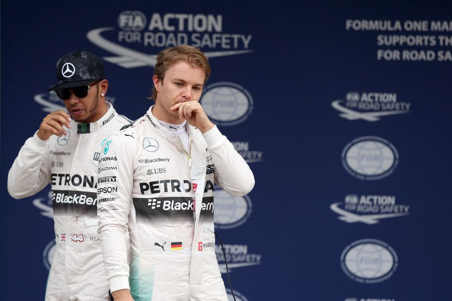 Lewis Hamilton and pole sitter Nico Rosberg after qualifying