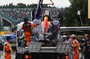Daniil Kvyat's RB10 returns to the pit after the crash