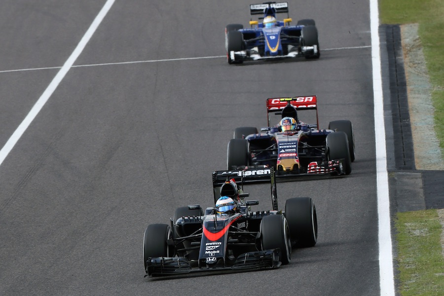 Fernando Alonso leads Carlos Sainz