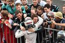 Mercedes members celebrate the winner Lewis Hamilton
