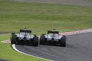 Lewis Hamilton and Nico Rosberg battle at the start of the race