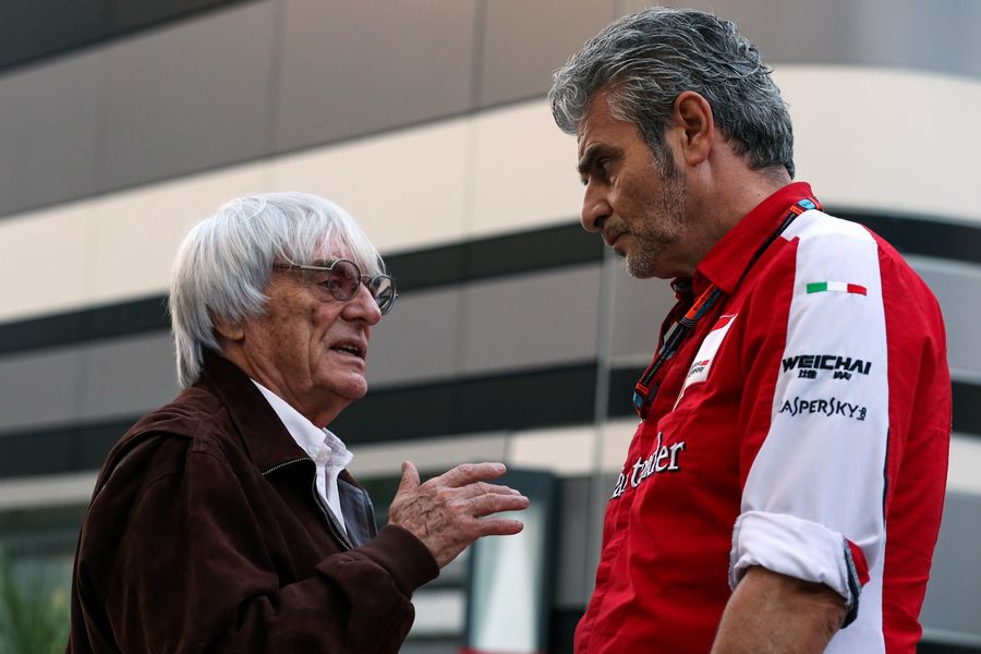 Bernie Ecclestone chats with Maurizio Arrivabene