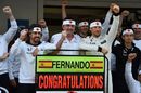 Fernando Alonso celebrates 250 Grands Prix with Jenson Button and McLaren team
