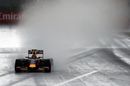 Daniil Kvyat takes the Red Bull RB11 through the wet