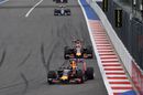 Daniil Kvyat battles for a position with his teammate Daniel Ricciardo