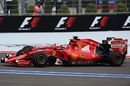 Sebastian Vettel and Kimi Raikkonen battle for a position