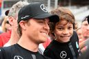 Nico Rosberg poses with a young fan in Austin