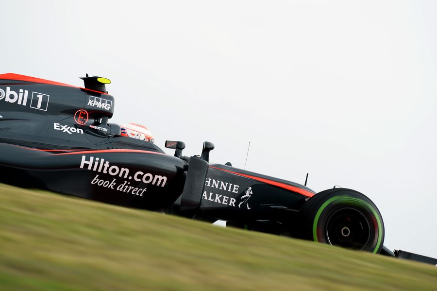 Jenson Button on track on intermediate tyres