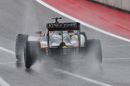 Nico Hulkenberg drives through the spray