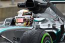 Lewis Hamilton sits in the Mercedes cockpit
