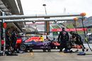 Red Bull mechanics wheel Daniil Kvyat back into the garage