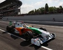 Adrian Sutil leaves the pit lane during qualifying